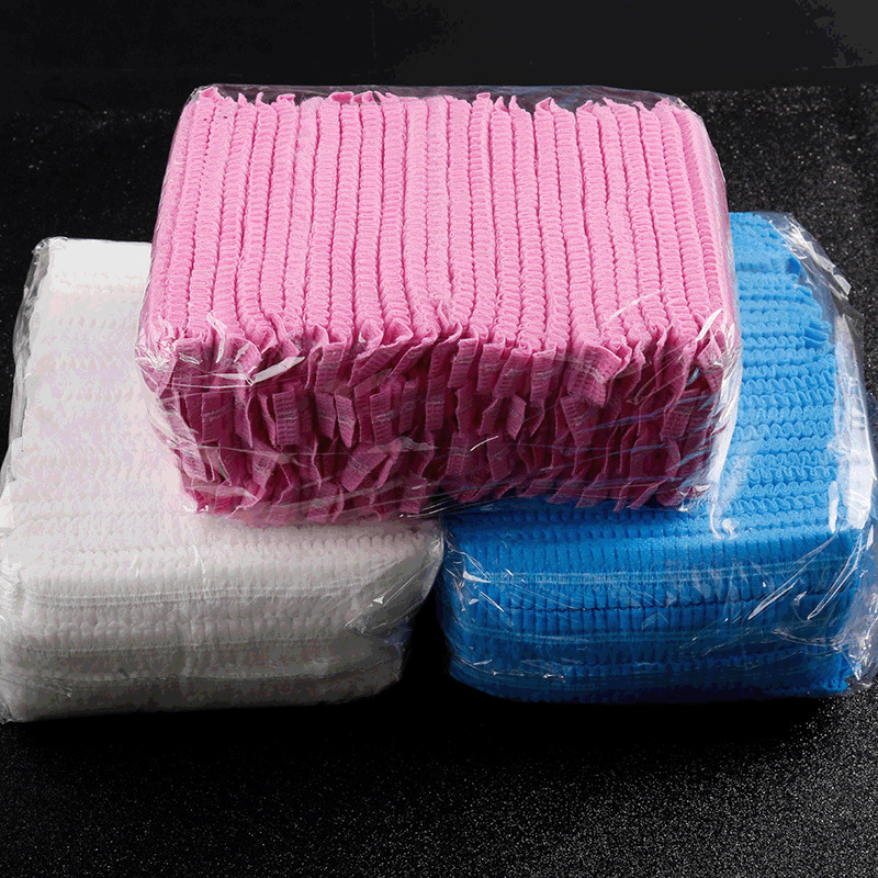 Jednokratna kapa od netkanog materijala s trakom, dvostruki rebrasti dizajn, obložena okruglim rubom, bez otvora za ventilaciju, za kućnu i tvorničku uporabu