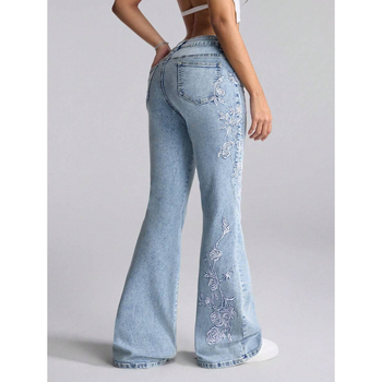 Denim teksapüksid lillemotiiviga, kits lõige, kaldkõrvetega taskud, fleecevooder