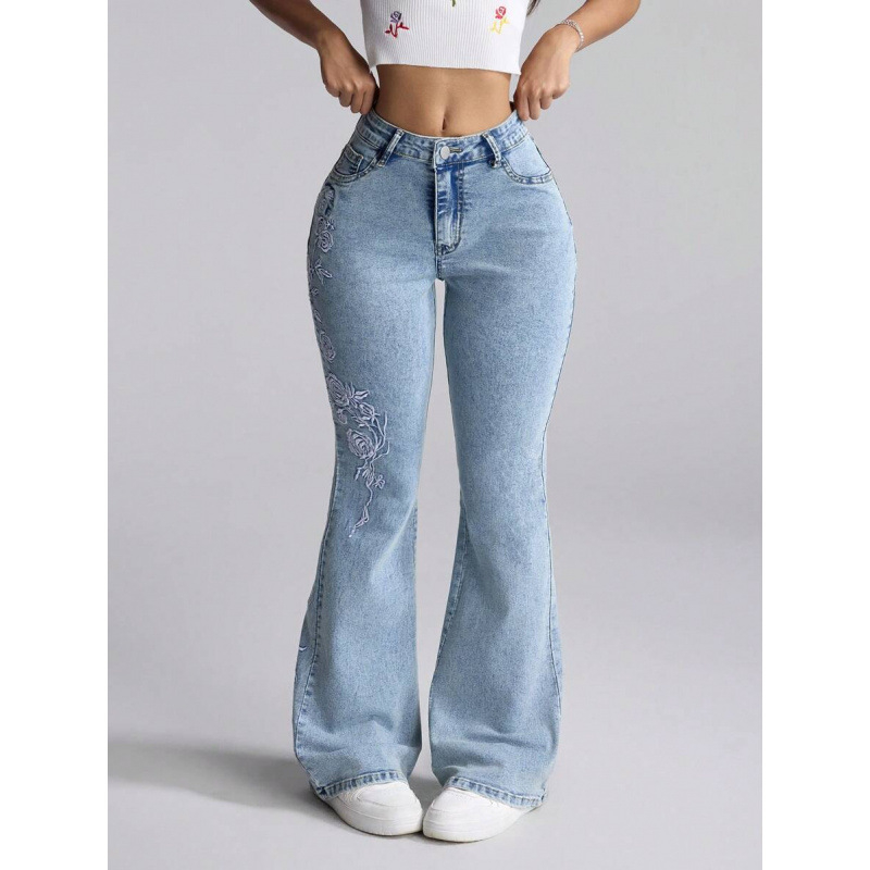 Denim teksapüksid lillemotiiviga, kits lõige, kaldkõrvetega taskud, fleecevooder