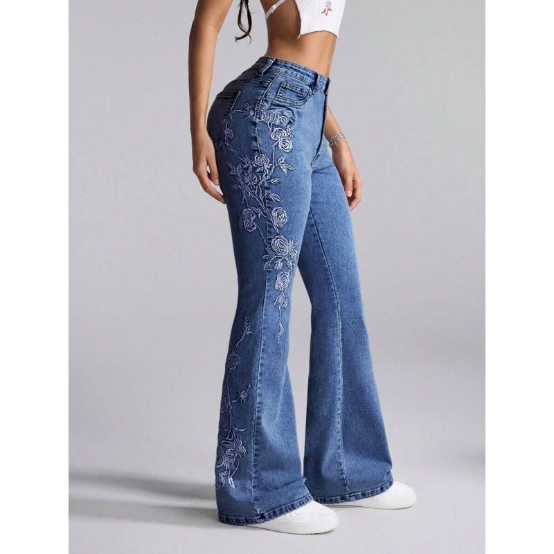 Denim teksapüksid lillemotiiviga, kits lõige, kaldkõrvetega taskud, fleecevooder