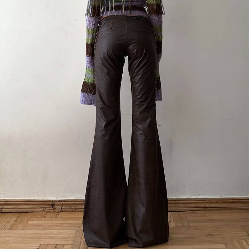 Pikkad püksid madala vöökohtaga, patchwork nahadetailidega, trumpet lõikega, polüester PU-ga, punk street stiil