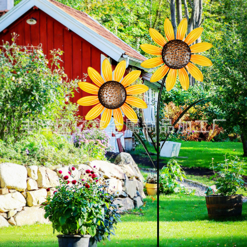 Sepistatud rauast aiatuulekeerutaja, päevalille motiiviga – maastik-stiil, valatud ja osaliselt mehhaaniline valmistus, välist dekoratsioon