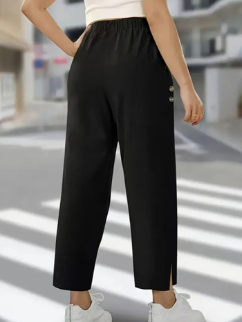 Naiste igapäevased püksid kõrgema vööga, pikkus üheksa kümnendikku, lõigatud äär ja nupud, jääsili polüester, kerge venivus, patchwork disain