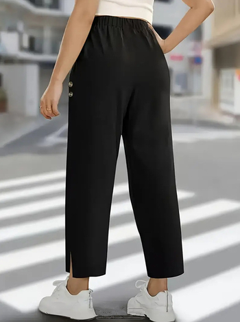 Naiste igapäevased püksid kõrgema vööga, pikkus üheksa kümnendikku, lõigatud äär ja nupud, jääsili polüester, kerge venivus, patchwork disain