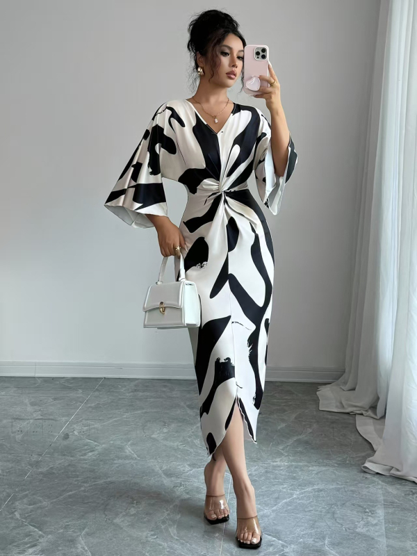 Kleit trikotaažist materjalist, trükiga, V-kaelus, kõrge vöökoht, midi pikkus, 3/4 varrukad