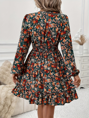 Polüesterist kleit lillemustriga, V-kaelus, laternkäised, keskmise pikkusega puf seelik