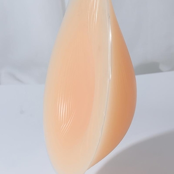 Rinnapadjad – tilgakujuline kuju, pits, tavaline paksus, 1 paar, pärast operatsiooni