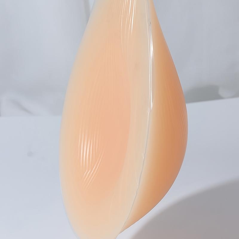 Rinnapadjad – tilgakujuline kuju, pits, tavaline paksus, 1 paar, pärast operatsiooni