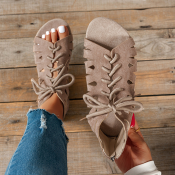 Rooma sandaalid tekstiili ülaosaga, kummist tallaga, ümmarguse varbaga, ees sõlmedega