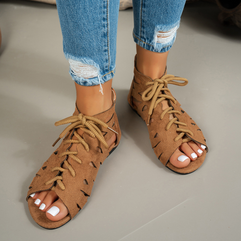 Rooma sandaalid tekstiili ülaosaga, kummist tallaga, ümmarguse varbaga, ees sõlmedega