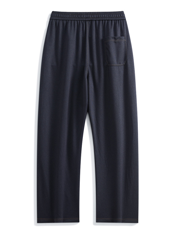 Igapäevased püksid sirge lõikega, vaba sobivus, keskmise kõrgusega vöökoht, köisnööriga kinnituv, polüestri kangas, kortsuvaba.