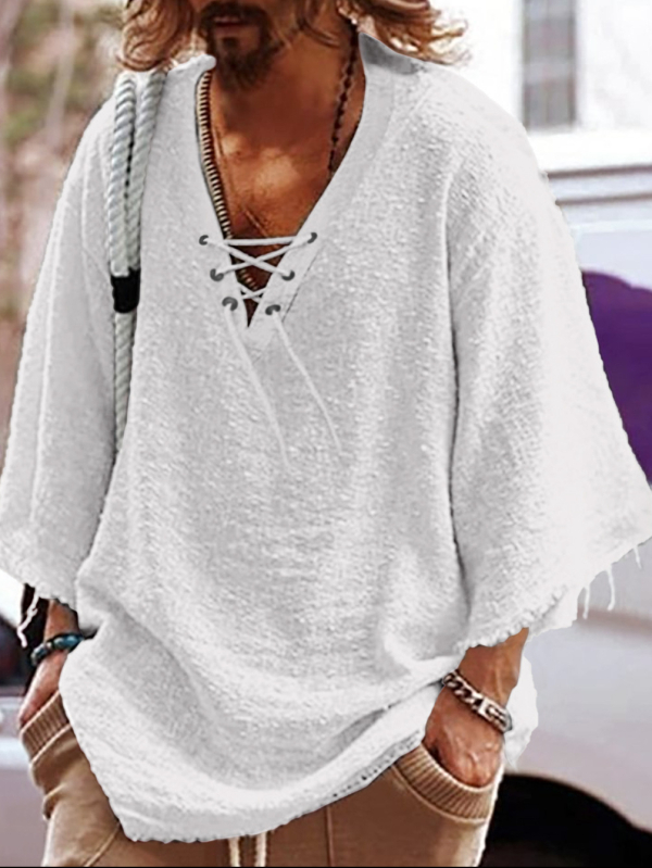 Lõdva lõikega särk poolpikkade varrukatega, V-kaelus nööriga, puuvillast-poliesteri segu