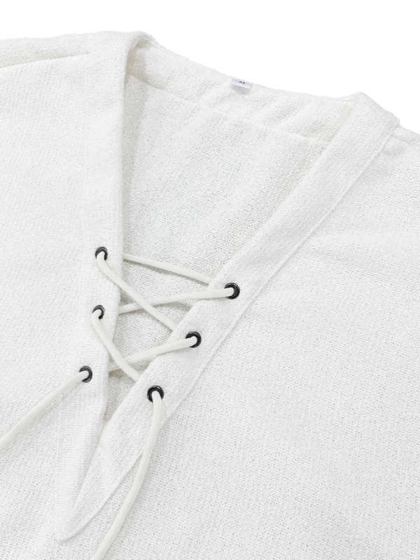 Lõdva lõikega särk poolpikkade varrukatega, V-kaelus nööriga, puuvillast-poliesteri segu