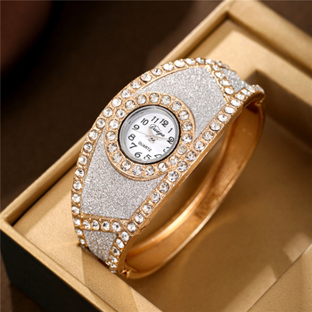 Naiste kvarts käekell käevõru stiilis, 32 mm ümmargune dial, korpus ja rihm sulamist, veekindlus puudub