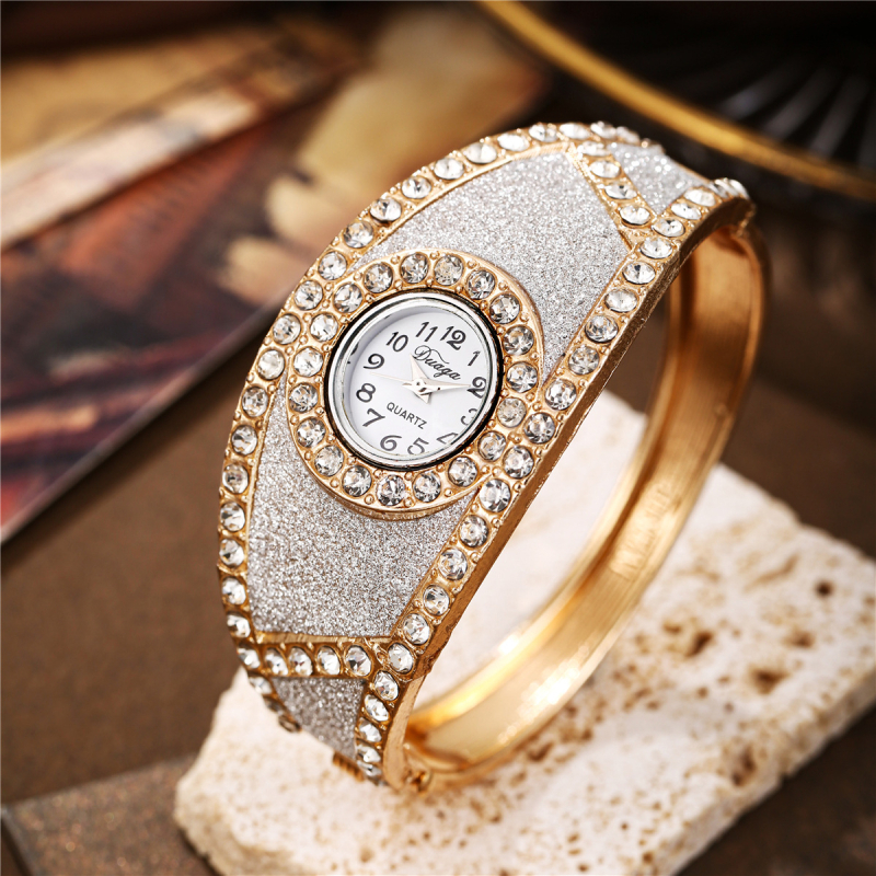 Naiste kvarts käekell käevõru stiilis, 32 mm ümmargune dial, korpus ja rihm sulamist, veekindlus puudub