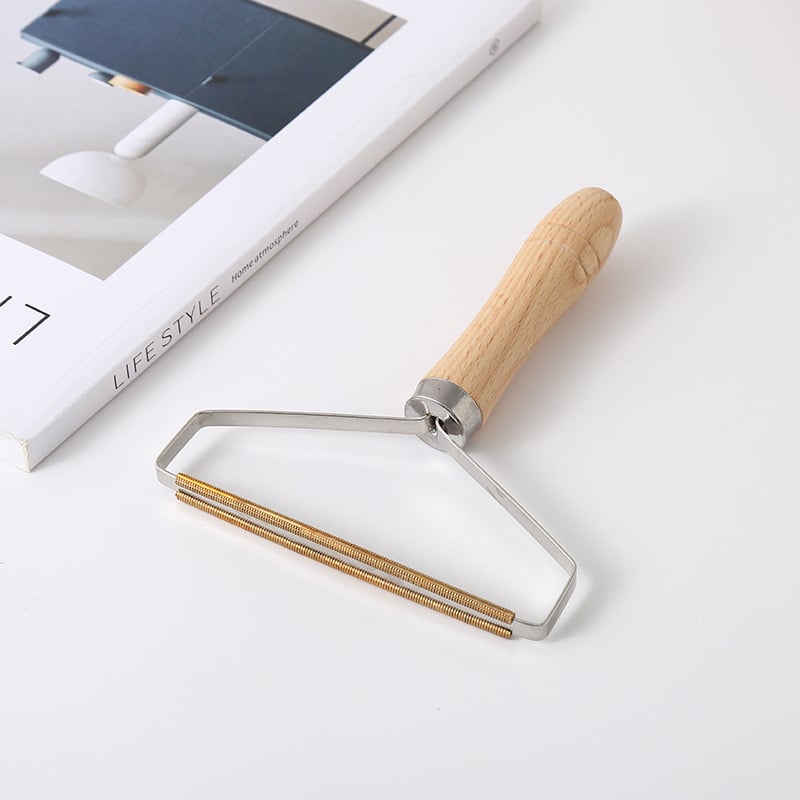 Käsitsi kasutatav kahetahuline puidust karvade eemaldaja, puidust käepidemeaga