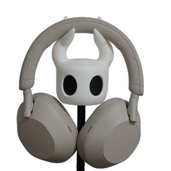 Kõrvaklappide alus lauale – minimalistlik lauaorganisaator (Kõrvaklappide tüüp: Earbud, L-kujuline pistik, kaelal asuvad kõrvaklapid)