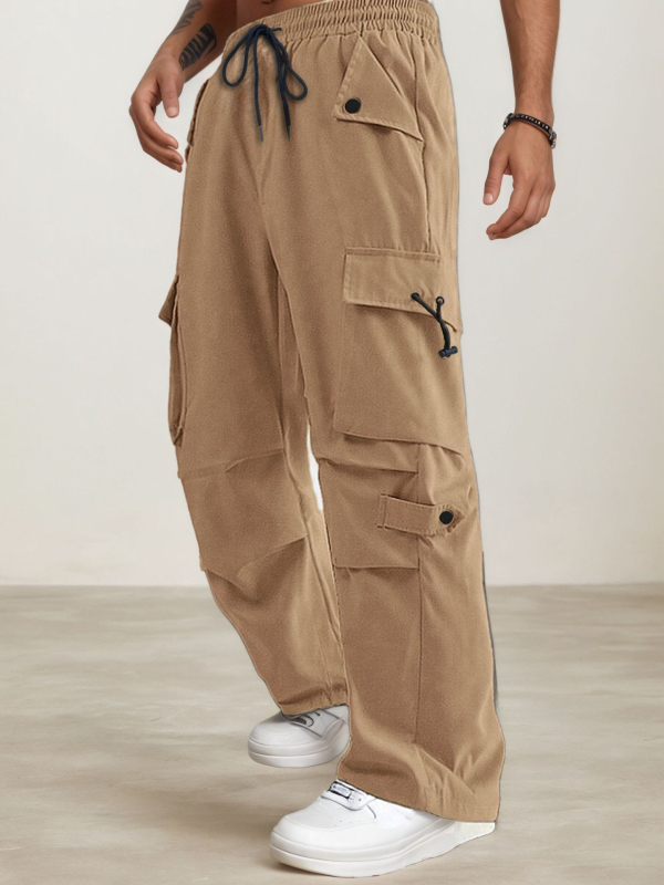 Meeste polüesterist sportpüksid sirge lõikega, mitmekülgsed taskud, kõrge vöökoht, pikad