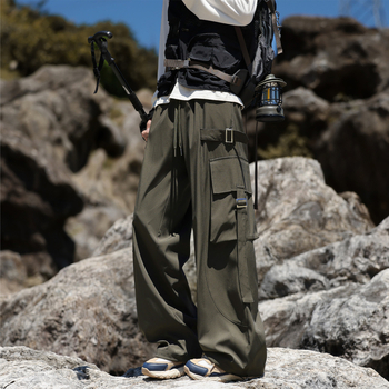 Traksidega teksad, laia lõikega, väga madal vöökoht, pikad püksid, keskmise paksusega, bambuskiud ja polüester