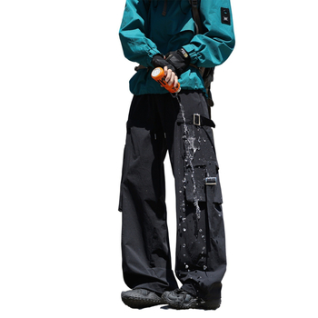 Traksidega teksad, laia lõikega, väga madal vöökoht, pikad püksid, keskmise paksusega, bambuskiud ja polüester