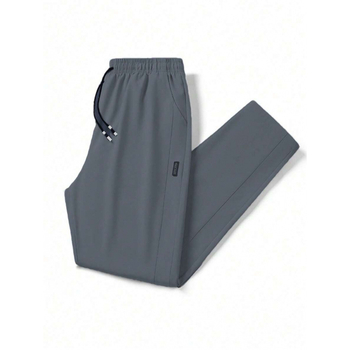 Sportlikud püksid vöökoha taskutega, sirge lõige, vaba istuvus, 9/10 pikkus, looduslikult värvitud puuvill, CVC kangas, kerge venivus, retro stiil