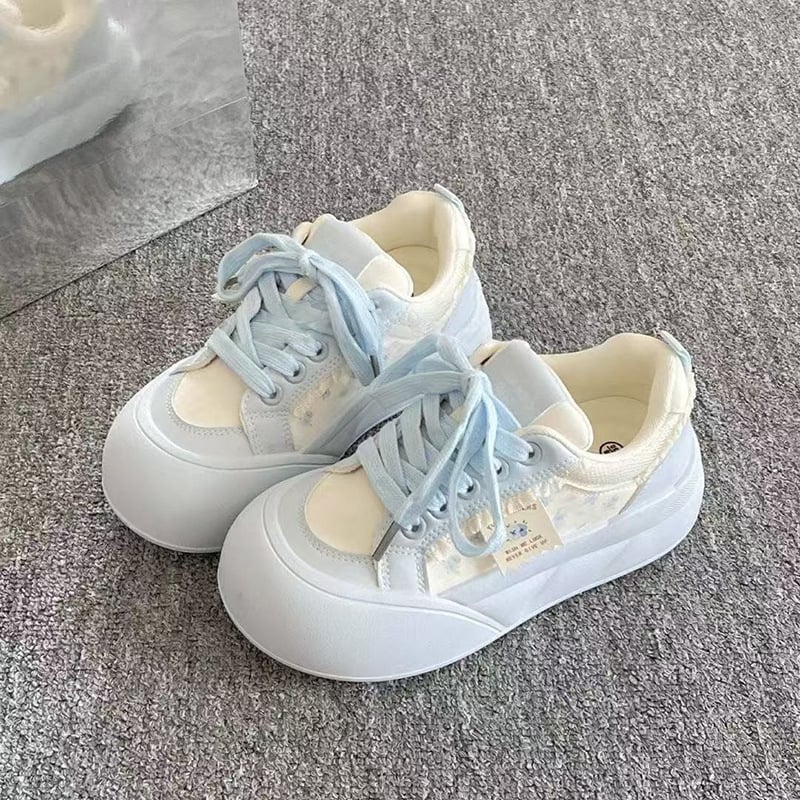 Naister igapäevased tossud sünteetsest nahast, kummist tall, ees rihmad, lühike varvas, kõrgendava sisetald