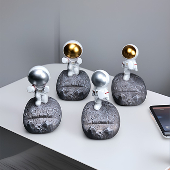 Stalak u obliku astronauta za telefone i tablete – smola, crtani stil, univerzalna kompatibilnost