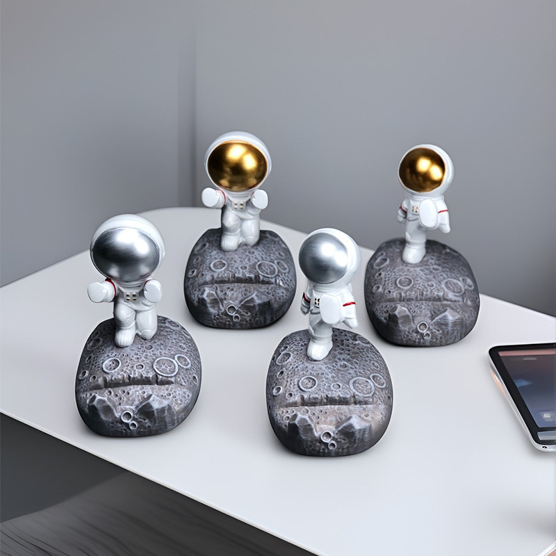 Stalak u obliku astronauta za telefone i tablete – smola, crtani stil, univerzalna kompatibilnost