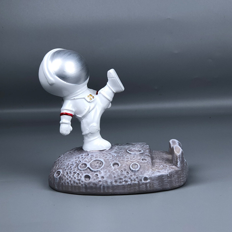 Stalak u obliku astronauta za telefone i tablete – smola, crtani stil, univerzalna kompatibilnost