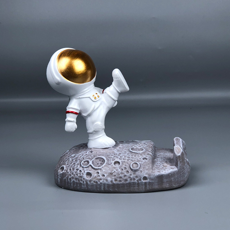 Stalak u obliku astronauta za telefone i tablete – smola, crtani stil, univerzalna kompatibilnost