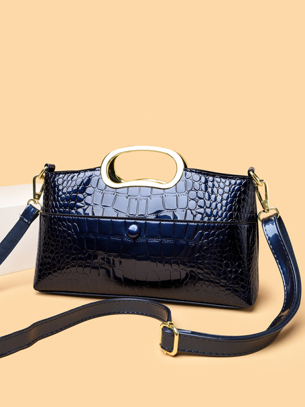 Torba od kože krokodila s zatvaračem, pravokutnog oblika, unutarnji džepovi sa zipom i džep za mobitel