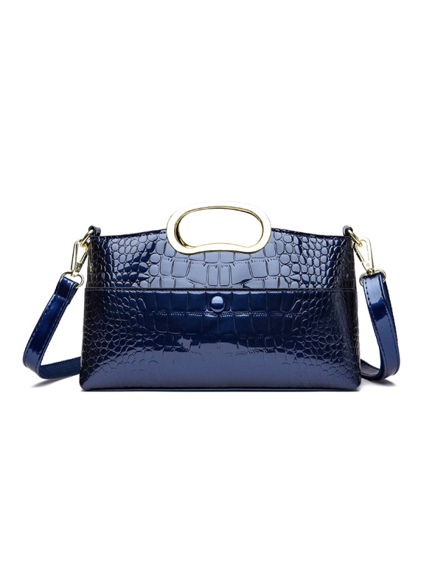 Torba od kože krokodila s zatvaračem, pravokutnog oblika, unutarnji džepovi sa zipom i džep za mobitel