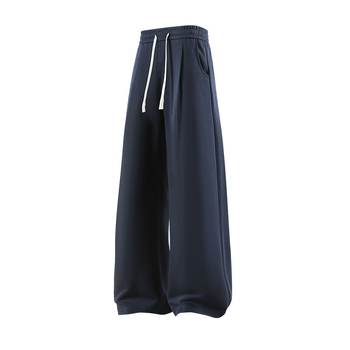 Muške zimske sportske hlače s flis podstavom, opuštena silueta, srednji pas s vezicama, tkanina 65% pamuk / 35% poliester, ravni kroj s džepovima