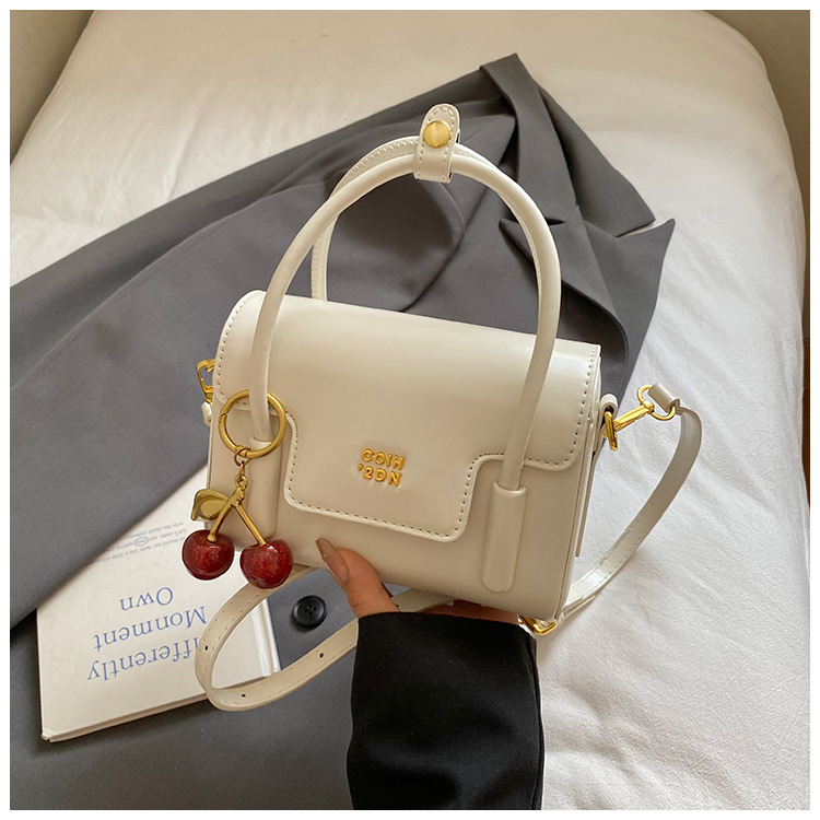 PU kožna torbica za rame – gradski minimalistički stil, otvaranje sa preklopom, kompaktni kvadratni oblik, džep za telefon