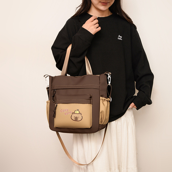 Vaikų kuprinė su animaciniu gyvūnų raštu 1–2 klasei, nailonas, pamušalas poliesteris, išlenktos pečių juostos, atspari dilimui