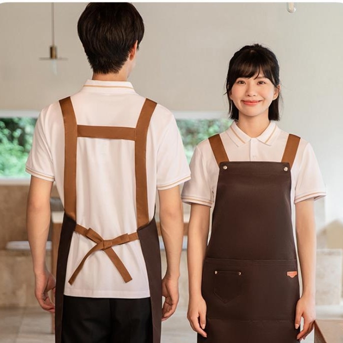 Nepremokavá bezrukávová zástera pre catering, hotely a kaviarne, s nastaviteľným krkom a ramenným popruhom v tvare písmena H