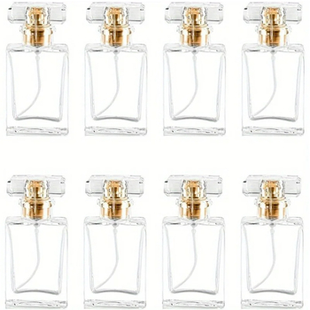 Parfüüri pudelite komplekt, puhutud klaas, hõbedase pihustiga ja akrüülkorgiga.