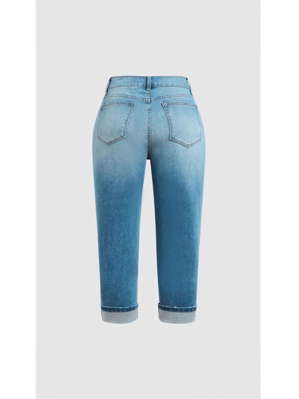 Denim teksad, kitsas lõige, keskmine talje, capri pikkus, kerge elastus, pestud viimistlus