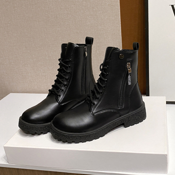 Naiste Martin saapad PU ülaosaga, kummist tald, keskmise pikkusega sääre, külglukustus, ümmarguse ninaga