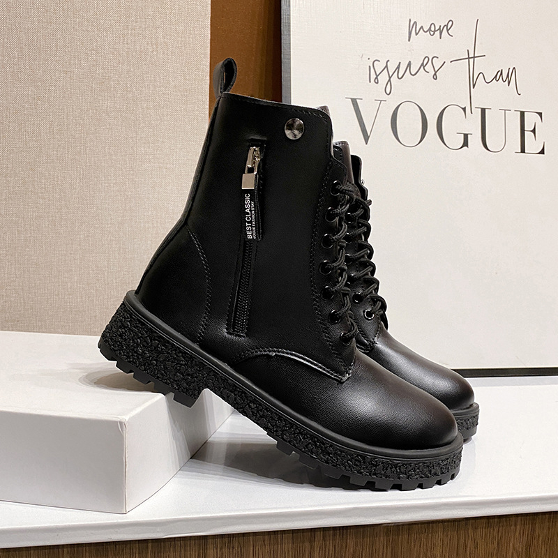 Naiste Martin saapad PU ülaosaga, kummist tald, keskmise pikkusega sääre, külglukustus, ümmarguse ninaga