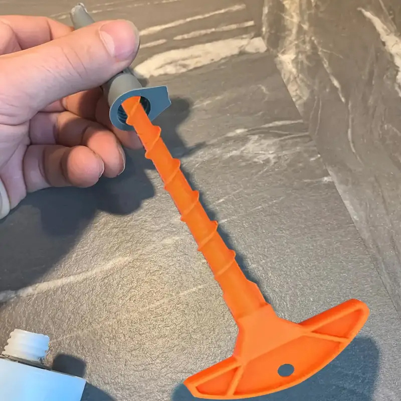 Sklenený tmelový uzáver a čistič trysky k pištoli na tmel, vhodné pre trubky s bežným priemerom