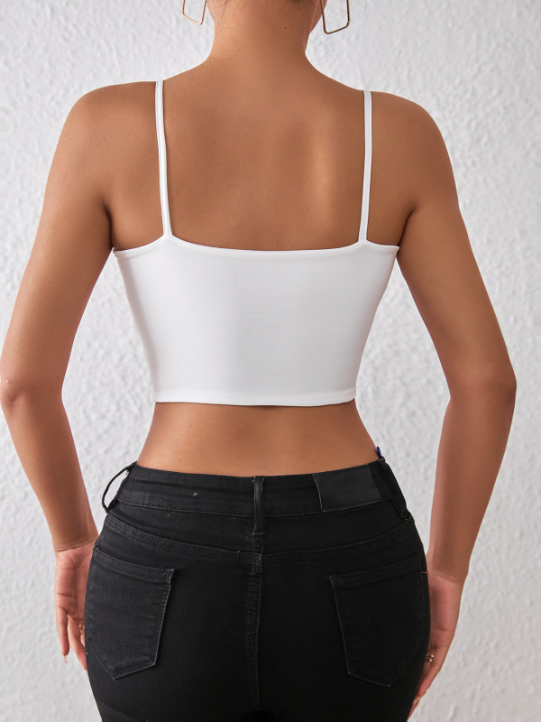 Crop top s tankima tanki remenčićima, uski kroj, jednobojan; Milk silk materijal; glavni materijal: poliester 91–99%; podstava: poliester 91–99%; duljina ≤ 40 cm