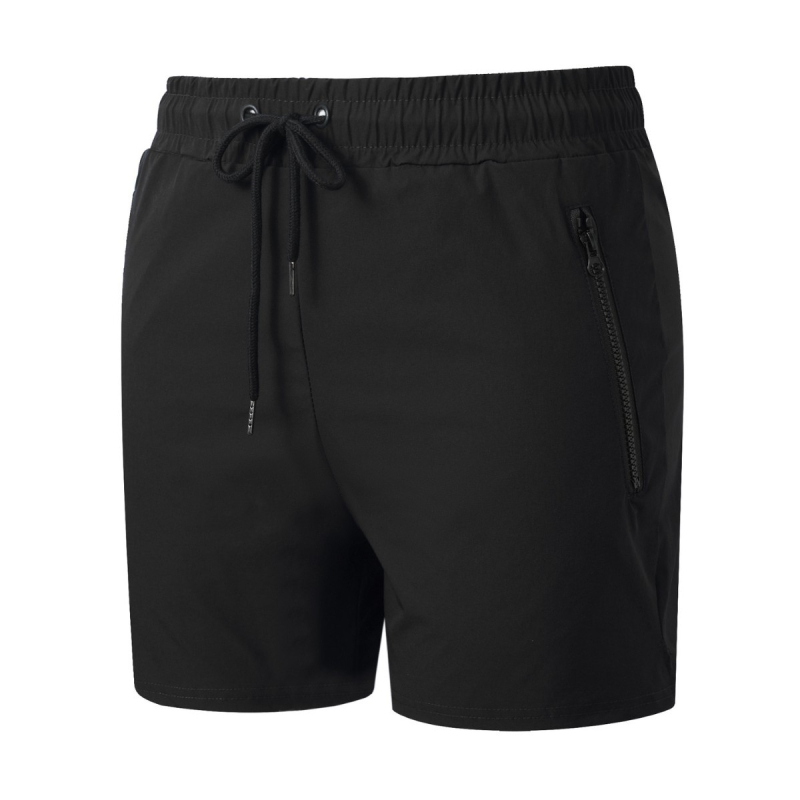 Pánske rýchloschnúce šortky – voľný strih, stredný pás, priedušné zloženie 90% nylon, vhodné na beh a fitness