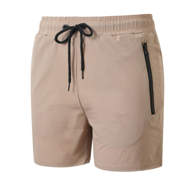 Pánske rýchloschnúce šortky – voľný strih, stredný pás, priedušné zloženie 90% nylon, vhodné na beh a fitness