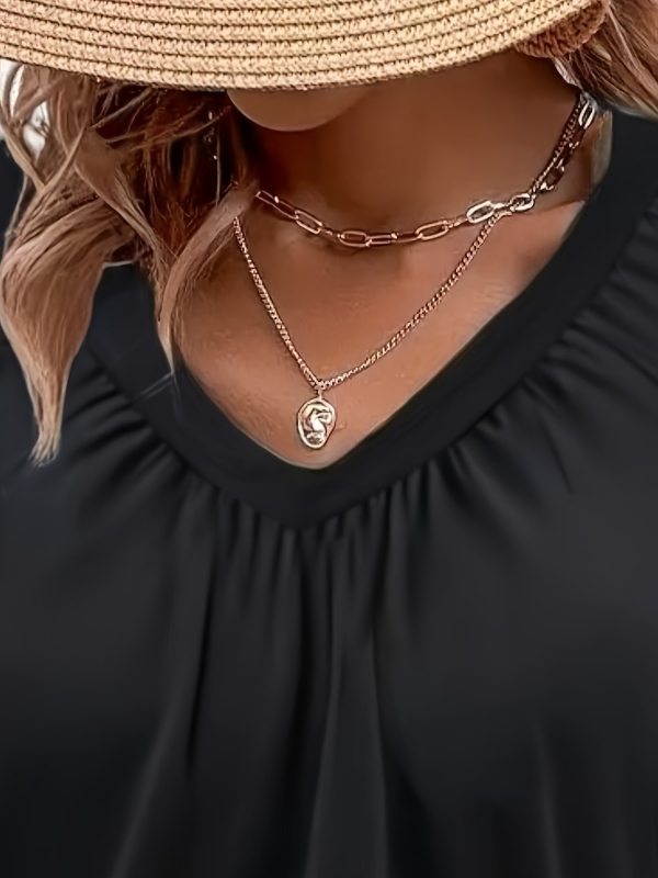 Полиестрова тениска с V-образно деколте, фонарен ръкав, плисирана текстура, средна дължина