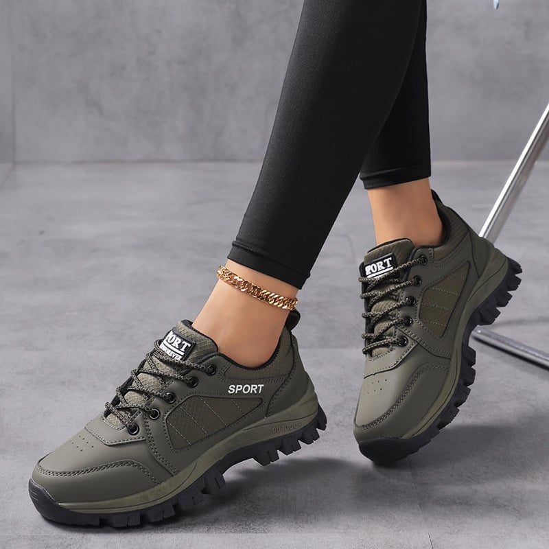 Γυναικεία παπούτσια πεζοπορίας – αντιολισθητική σόλα, επάνω μέρος από συνθετικό δέρμα, μεσαία σόλα από καουτσούκ, χαμηλό ύψος φτέρνας (1–3 εκ.), κορδόνια μπροστά