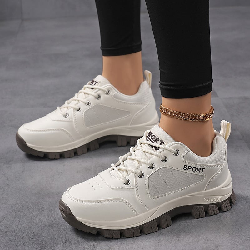 Γυναικεία παπούτσια πεζοπορίας – αντιολισθητική σόλα, επάνω μέρος από συνθετικό δέρμα, μεσαία σόλα από καουτσούκ, χαμηλό ύψος φτέρνας (1–3 εκ.), κορδόνια μπροστά