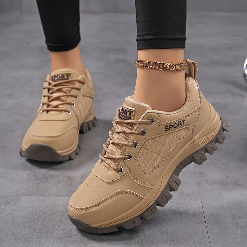 Γυναικεία παπούτσια πεζοπορίας – αντιολισθητική σόλα, επάνω μέρος από συνθετικό δέρμα, μεσαία σόλα από καουτσούκ, χαμηλό ύψος φτέρνας (1–3 εκ.), κορδόνια μπροστά