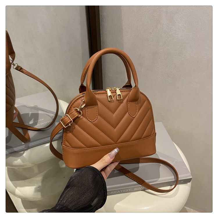 Geantă de tip cochilie, în stil stradal, din PU, închidere cu fermoar, fără căptușeală, pentru uz zilnic — Jinhe Tang Chao JS9950, Vara 2025