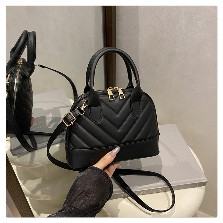 Geantă de tip cochilie, în stil stradal, din PU, închidere cu fermoar, fără căptușeală, pentru uz zilnic — Jinhe Tang Chao JS9950, Vara 2025